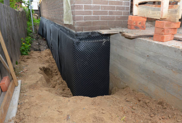 Happy homeowners after waterproofing job in Surgoinsville